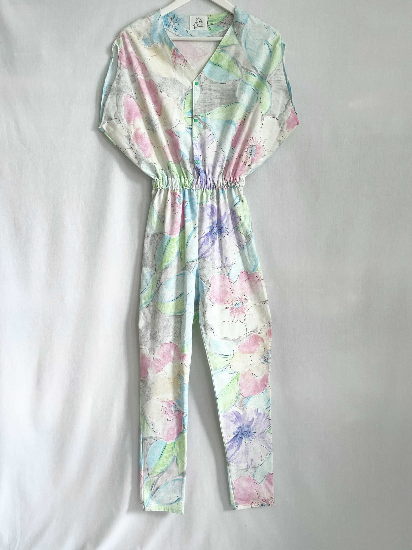 Buksedragt - Blomster i pastel