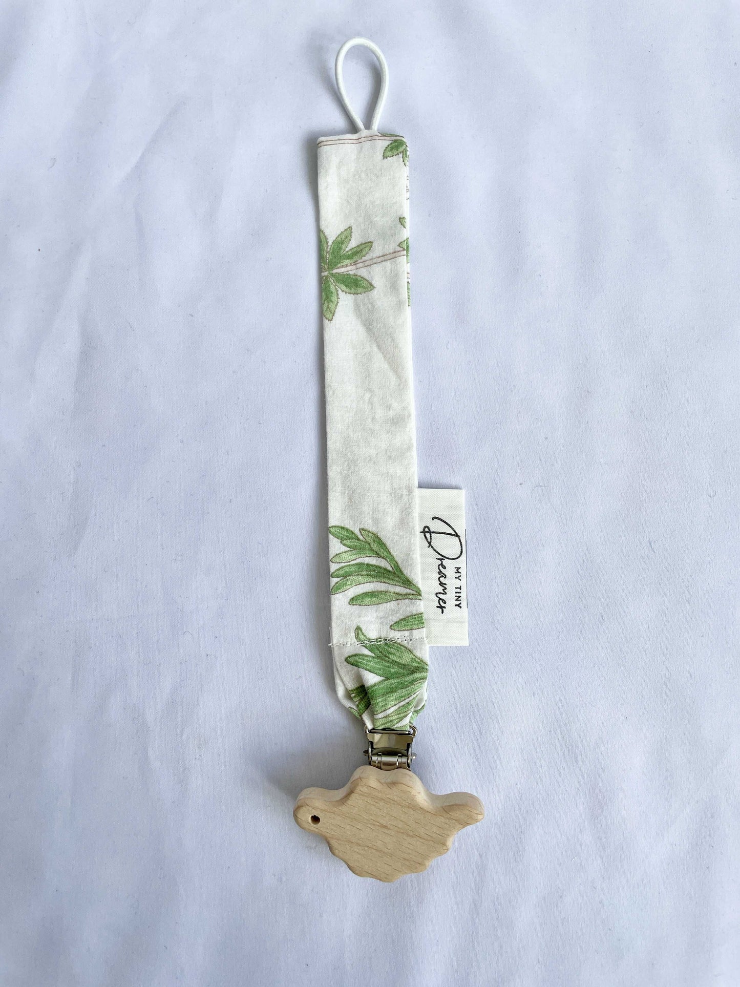 Suttesnor med blomster og blade