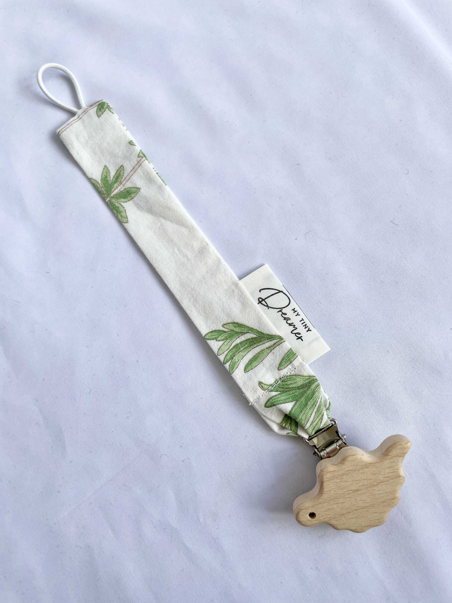 Suttesnor med blomster og blade