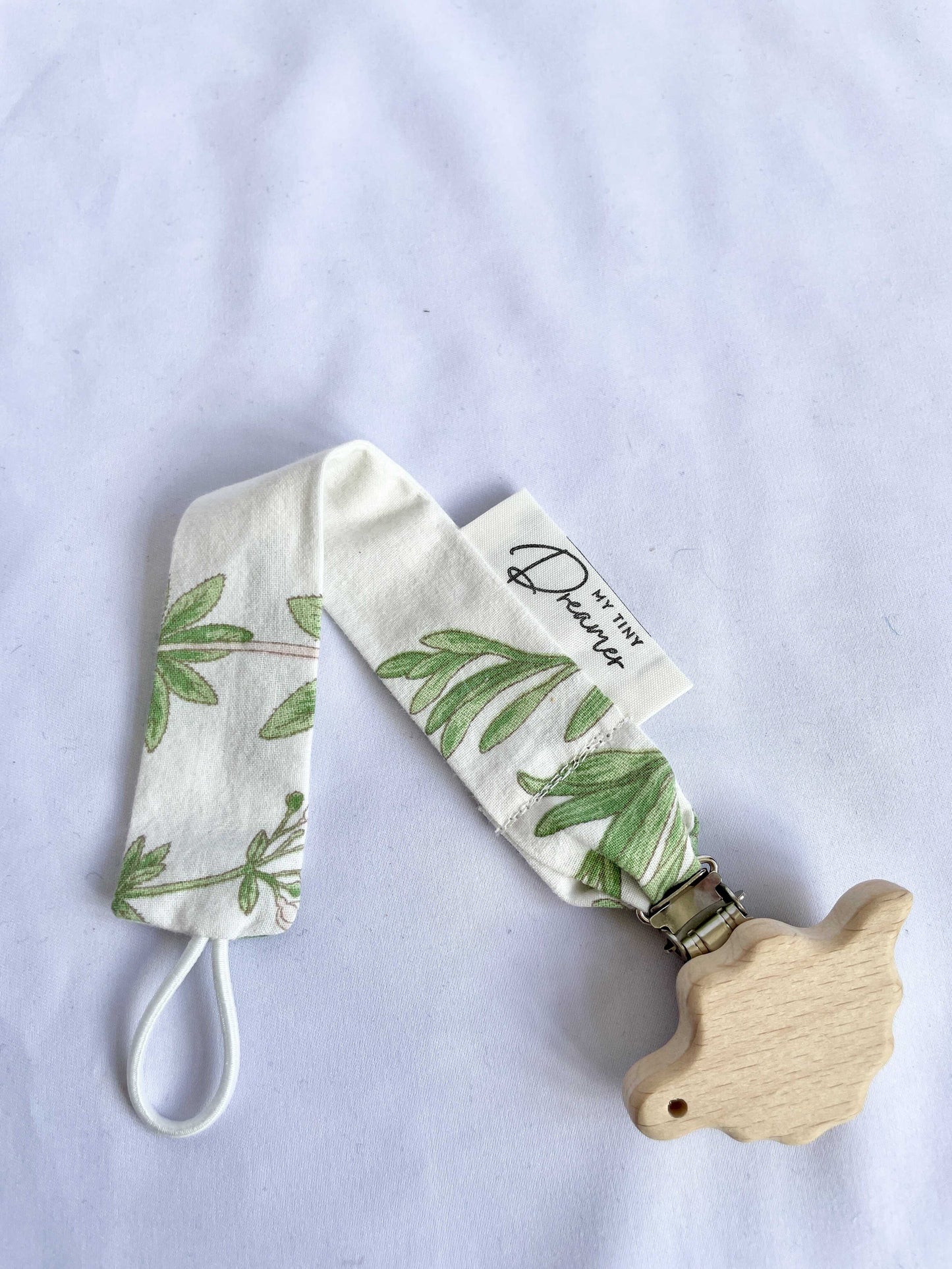 Suttesnor med blomster og blade